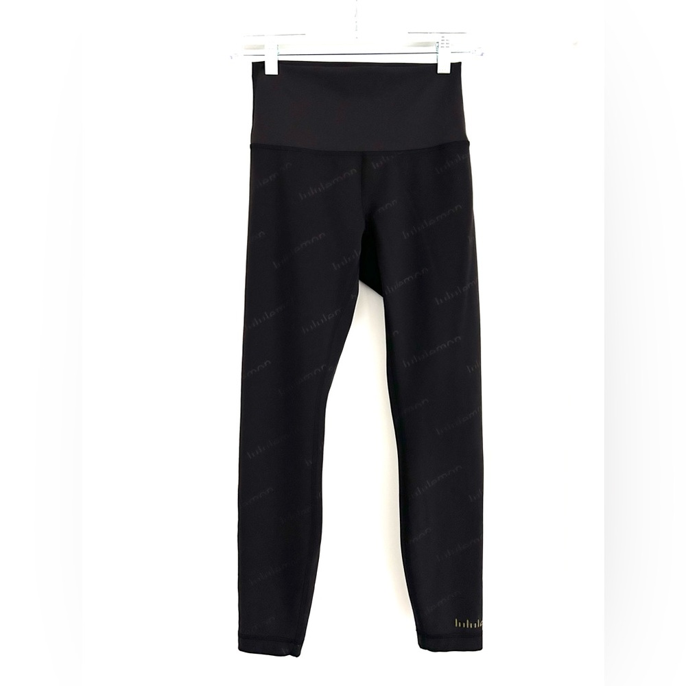 Lululemon Size 6 Black Leggings with Printed Logo